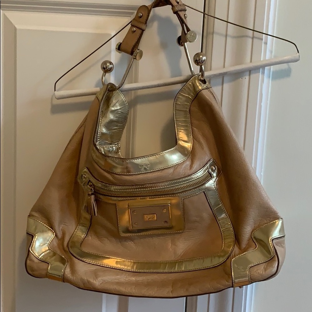 Gold Anya Hindmarch purse